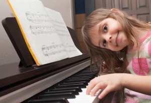 Little girl playing piano